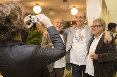 Rafael Urban taking a picture of Massimo Canevacci, Martin Grossmann and Leopold Nosek